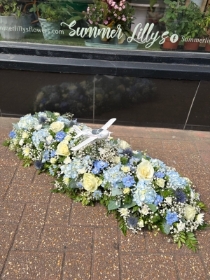 Funeral spray with personal touch