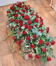 red rose casket spray