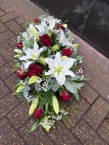 Rose and Lilly casket spray