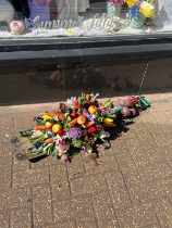 Spade with flowers and plants