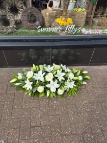 White rose and Lilly casket spray